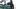 Mikrofon vor Bildschirm mit Audiosoftware
